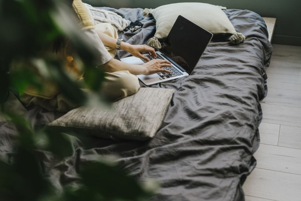 Using a laptop in bed